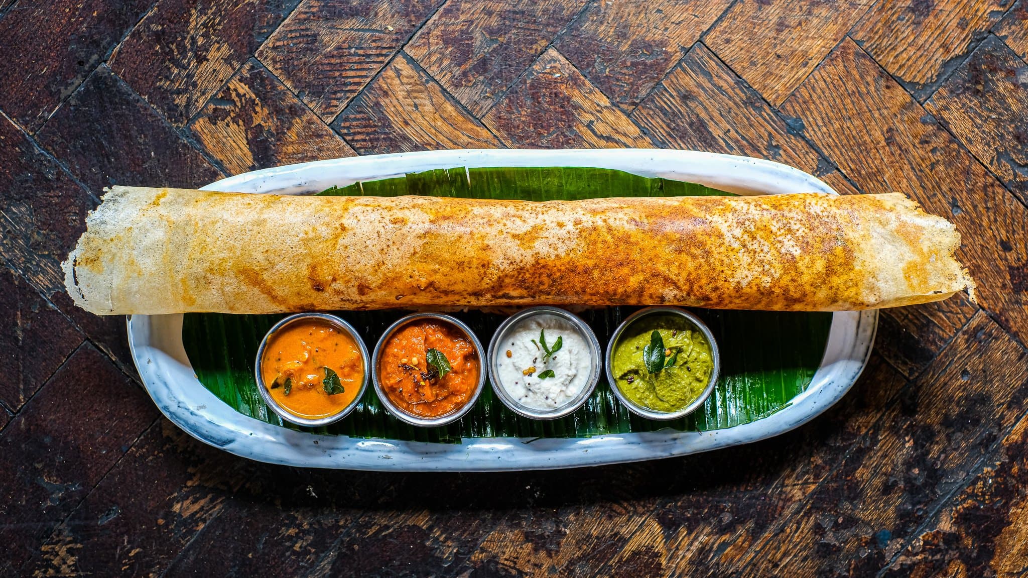 Kal Dosa With Sambar,Chutneys